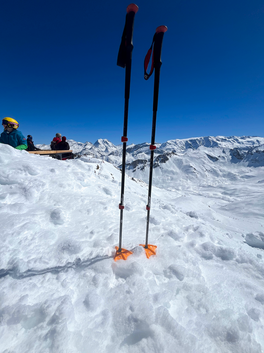 Skimojis Entenfuss Skistockteller gelb am Berg